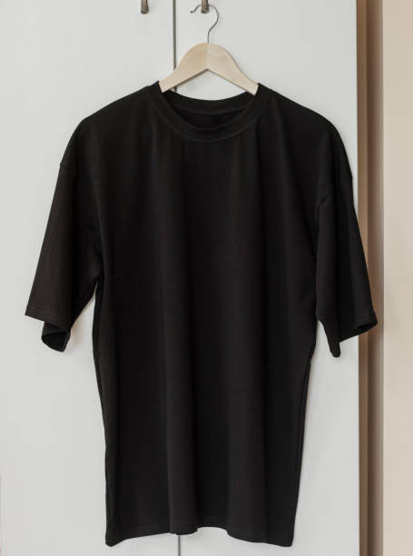 istock Blue t-shirt on hanger ready for your own graphics 1331517111