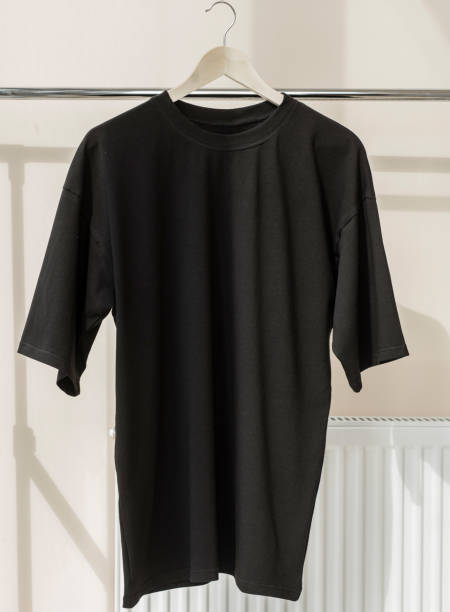 istock Blue t-shirt on hanger ready for your own graphics 1331517112