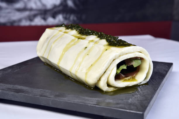 istock nbasil pesto mozzarella roulade served on stone. 1331529511