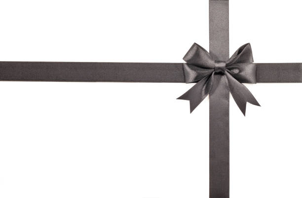 istock Black bow with ribbon isolated on white 1331536003
