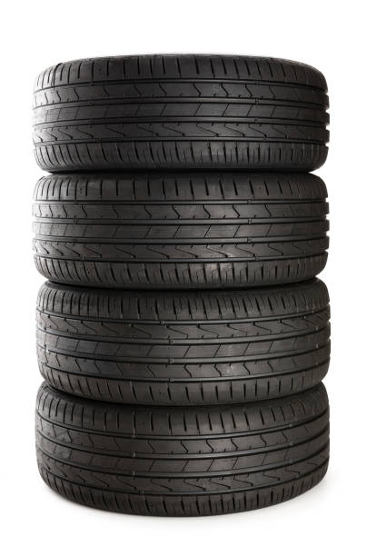 four black tires isolated on white background