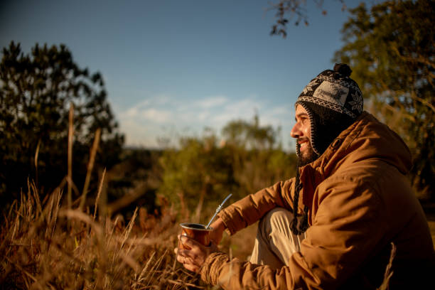 istock Man drinking mate in the late winter afternoon 1331537060