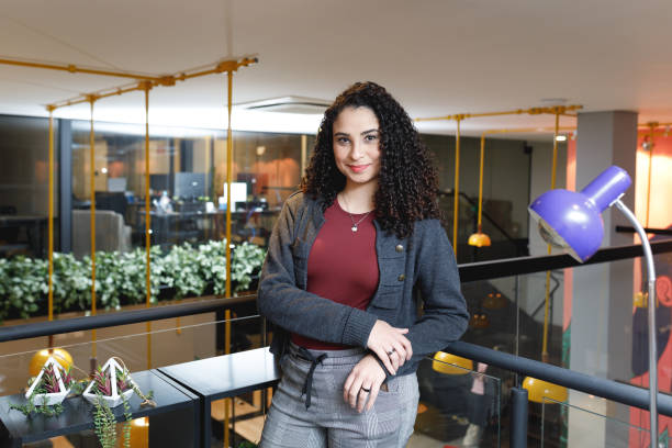 istock Inspiring woman standing in the office 1331541179