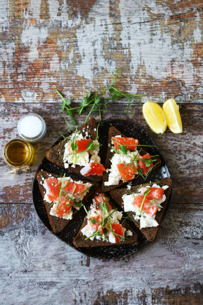 istock Plate with toasts with salmon and white cheese. 1331541589