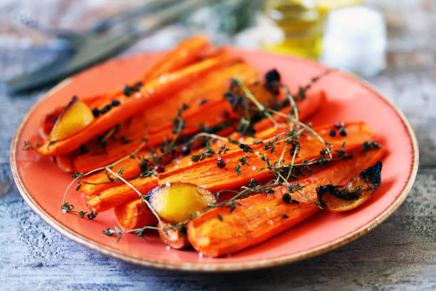 istock A plate with baked carrots. 1331541740