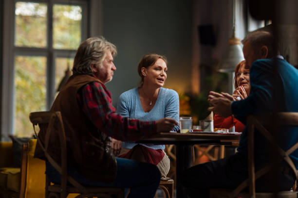 istock Catching up with good friends over coffee 1331541778