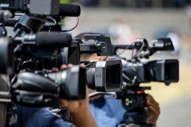 Video cameras of TV news channels stock photo
