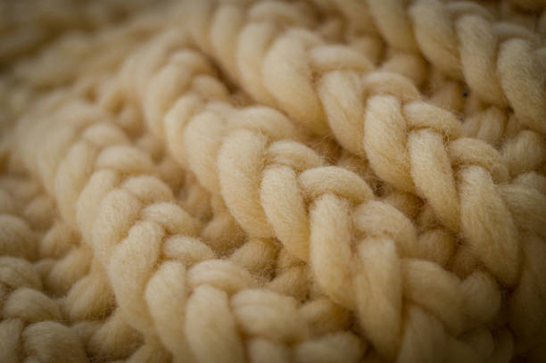 close-up of the texture of a handmade knitted sweater. rows of loops. - seam macro rough striped imagens e fotografias de stock