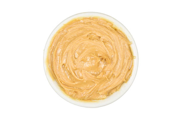 istock Peanut Butter In Small Bowl Isolated On White Background With Clipping Path 1331546247
