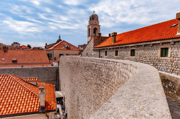 Walking on the Surrounding wall in Old town, Dubrovnik,  Croatia Dubrovnik,  Croatia. dubrovnik walls stock pictures, royalty-free photos & images