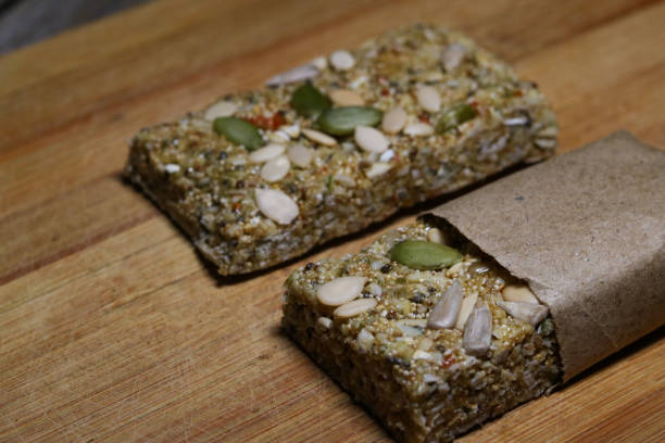 Protein bar is the protein rich, energy boosting, biotin rich, nutritious, healthy as well as tasty bar !! The recipe by bite n sip is easy, step by step n 100%home made stock photo