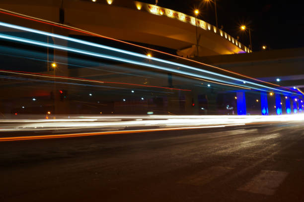 istock Vector image of colorful light trails with motion blur effect, long time exposure. 1331571809