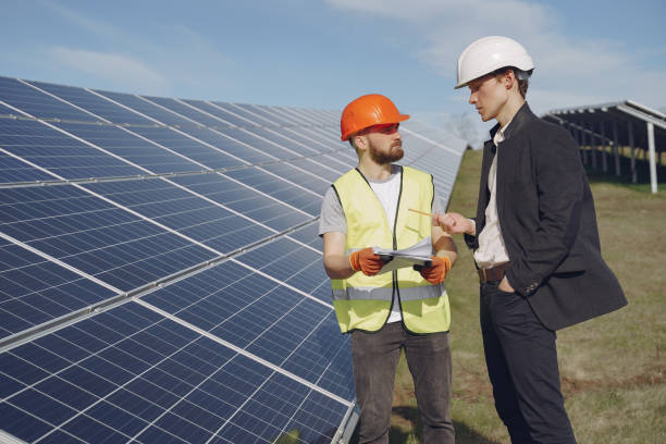 istock Foreman and businessman at solar energy station 1331578521