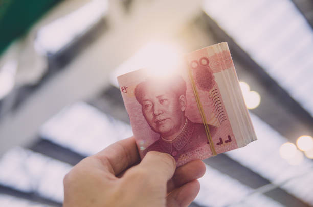 China yuan (CNY), China money, currency of China. Exchange money for China yuan, business and finance concept. stock photo