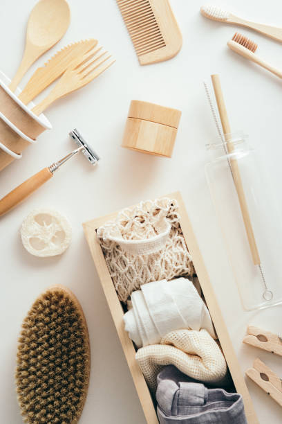 istock Set of eco-friendly zero waste accessories on white background. Disposable cutlery, bamboo bathroom tools, shopping bags, top view. 1331581587