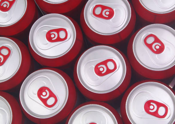 istock Red tin cans, top view. Beer or soft drink cans background. 1331582116