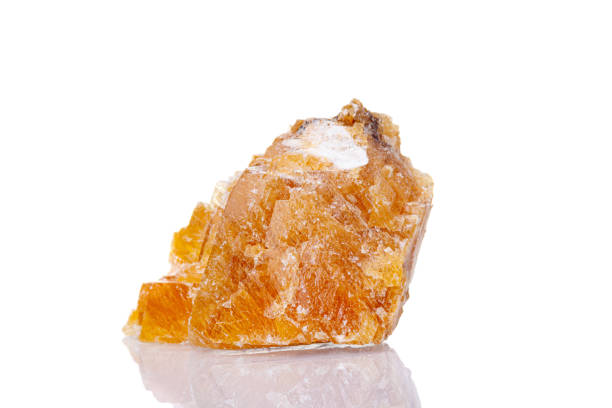 istock macro mineral stone yellow calcite on a white background 1331590743