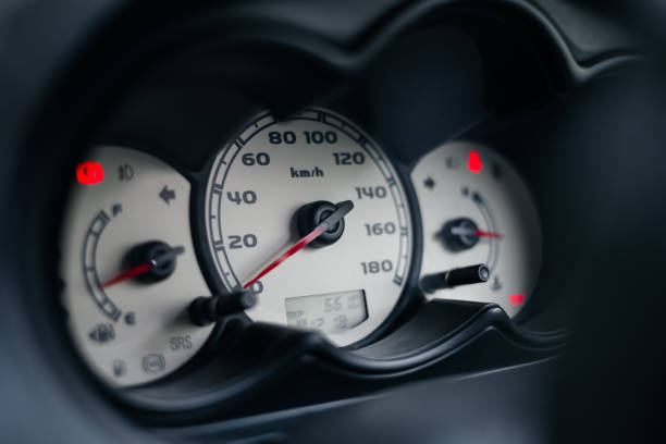 istock car interior dashboard details. Speedometr close up . Soft focus 1331592427