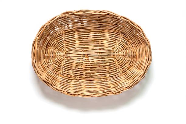 Empty wicker basket on a white background. Top view. stock photo