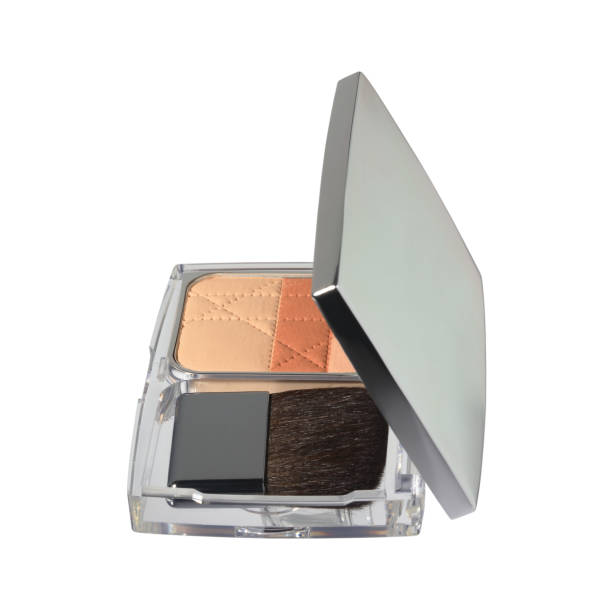 istock Dry face powder in silver square casket with makeup brush isolated on white 1331600792