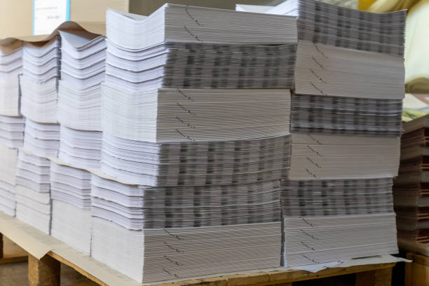 istock Paper books stack in printing or publishing company 1331604480