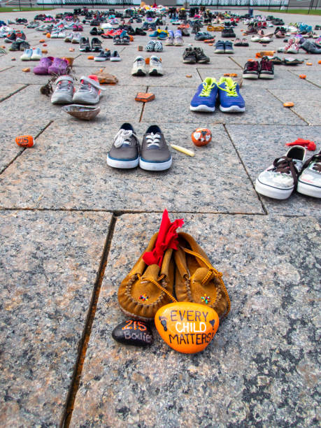Every child matters. Many children shoes on the Ottawa's Parliament Hill to remember the death of Native people children. stock photo