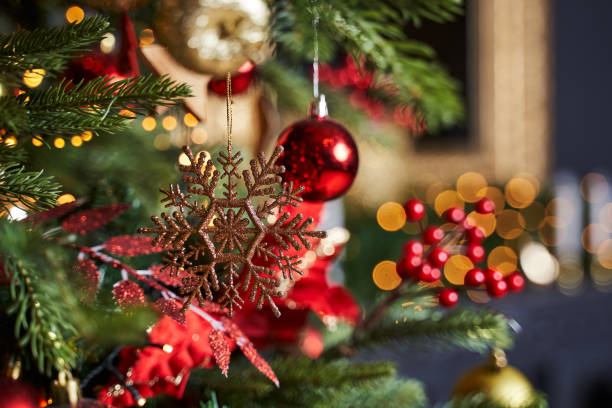 istock golden snowflake on the tree next to red toys 1331611867