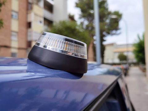 v16 approved emergency light in the rooftop of a car