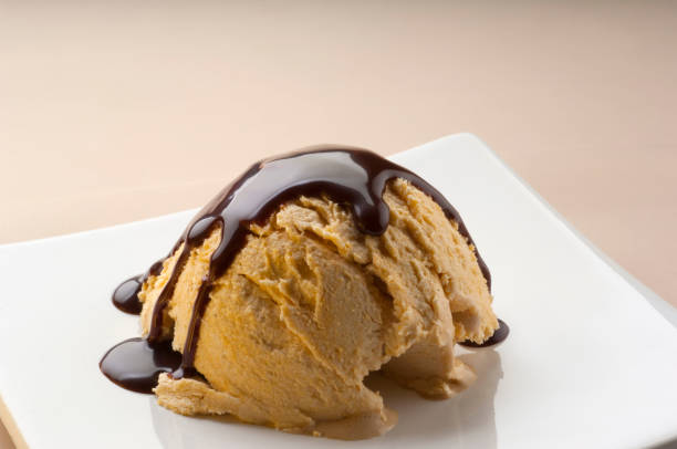 Scoops of ice cream decorated with chocolate