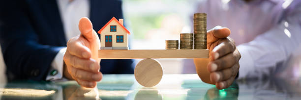 istock Real Estate House Money Equilibrium 1331623588