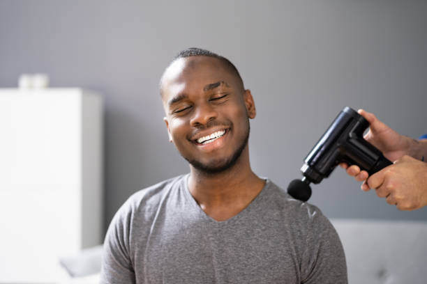 istock Shoulders Recovery Therapy Using Massage Gun 1331625781