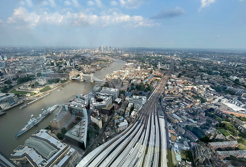 Aerial view looking east over London Bridge station rail complex, London, England, UK. Distinctive, well-maintained  architecture charts the history and development of the capital city with its famous London Landmarks in Summer, England, UK.