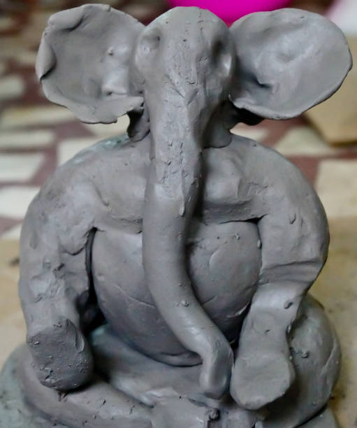istock Pune, India, 02 September 2018. Children classes for making Ganesh/Ganpati idol. eco friendly Ganesh/Ganpati idol or murti, home made eco Friendly Ganesha Idol for Ganapati Pooja. 1331632846