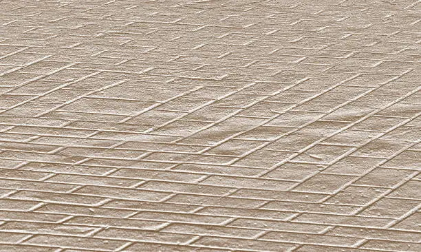 Photo of tile texture, beige. Embossed with irregularities and roughness. background