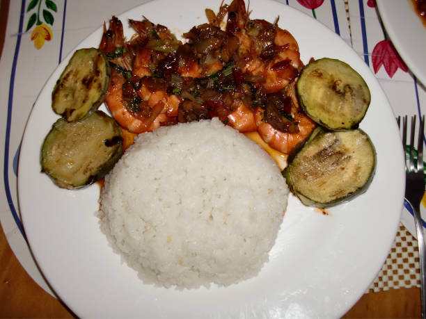 istock Shrimps with cucumbers and steamed rice 1331643389