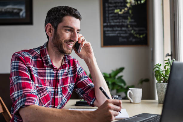 istock Businessman on phone call in home office 1331647664