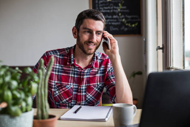 istock Man on the phone working from home 1331648700