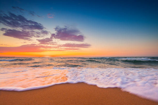 istock Beautiful sunrise over the sea and beach 1331653295