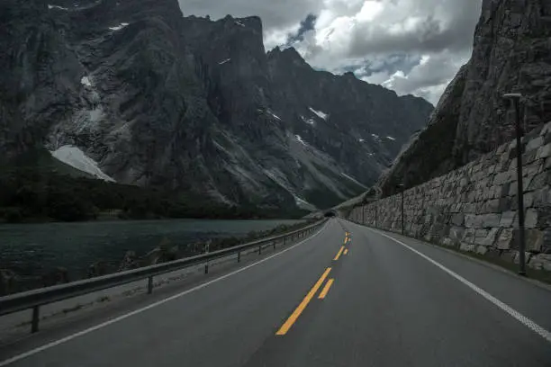 Photo of Scenic Road Though Dramatic Norwegian Landscape