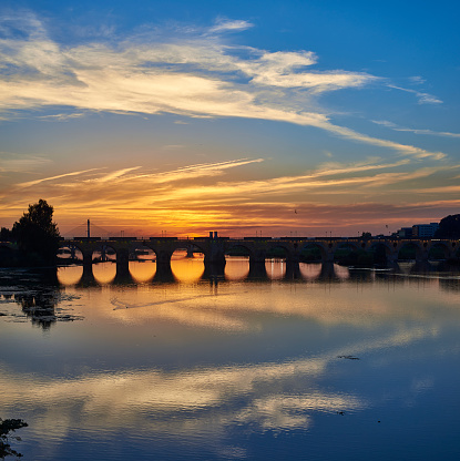 Roman bridge of Merida at sunset, province of Badajoz, Extremadura, Spain.