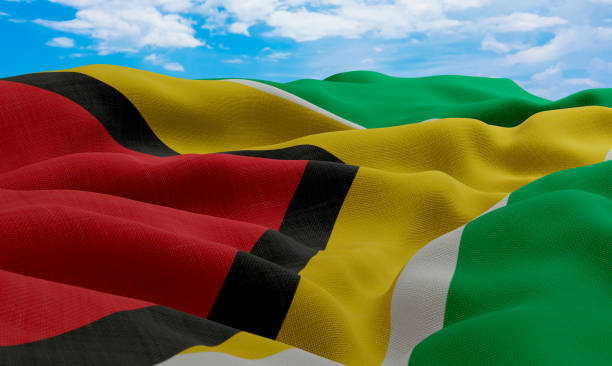 istock Guyana flag in the wind. Realistic and wavy fabric flag. 3D rendering. 1331662560