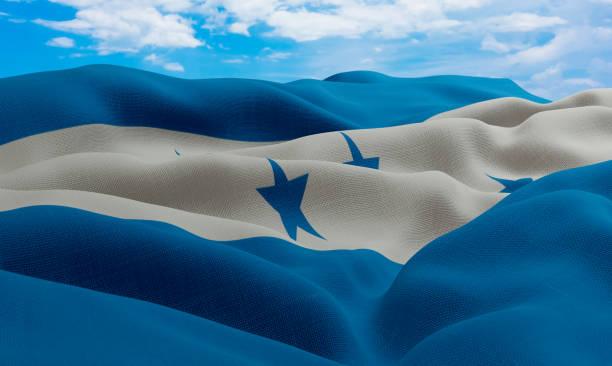 bandera de honduras en el viento. bandera de tela realista y ondulada. renderizado 3d. - tegucigalpa fotografías e imágenes de stock