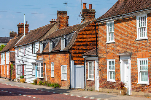 Essex, UK - July 20th 2021: A view of pretty townhouses in the beautiful village of Stock in Essex, UK.
