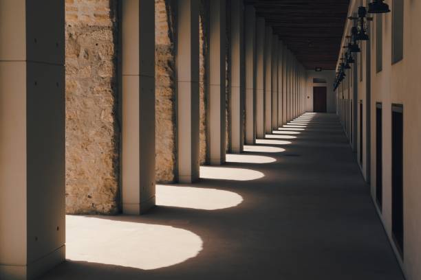 istock Portal with light and shadows in ancient eastern bastion.Corridor archway perspective. 1331665175
