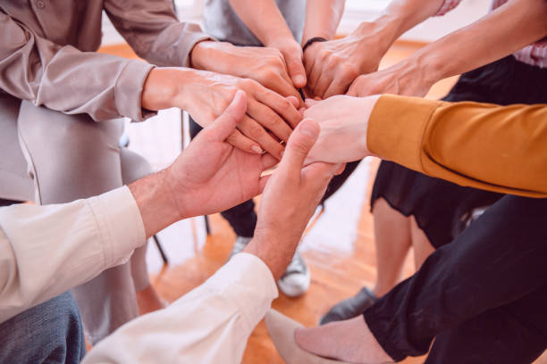 istock Human Hands holding together, closeup. 1331669431