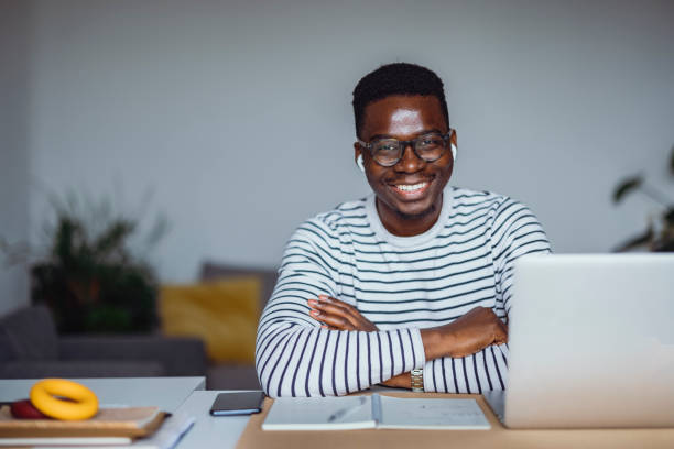 istock Smiling Businessman Working At Home 1331670568
