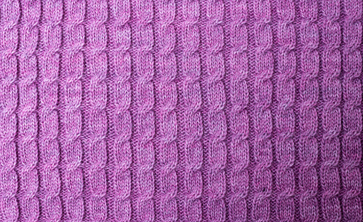 Purple knit fabric pattern as background