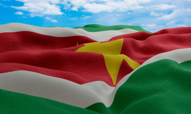 istock Suriname flag in the wind. Realistic and wavy fabric flag. 3D rendering. 1331673328