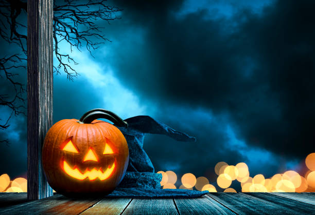 istock Jack O'Lantern And Witch's Hat On Porch 1331673415