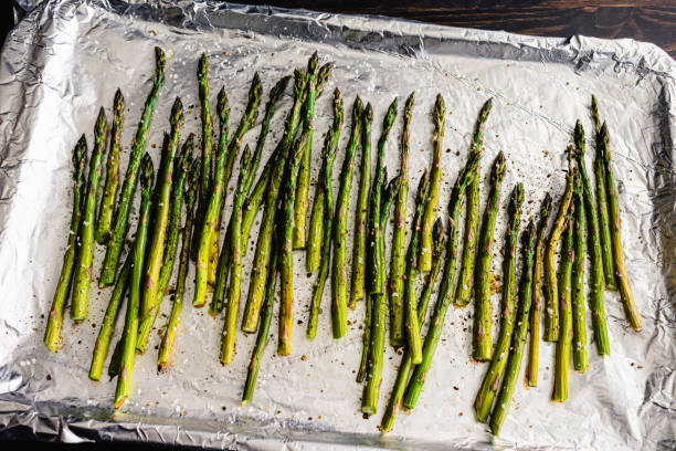 istock Roasted Asparagus Spears on a Foil Lined Sheet Pan 1331674272